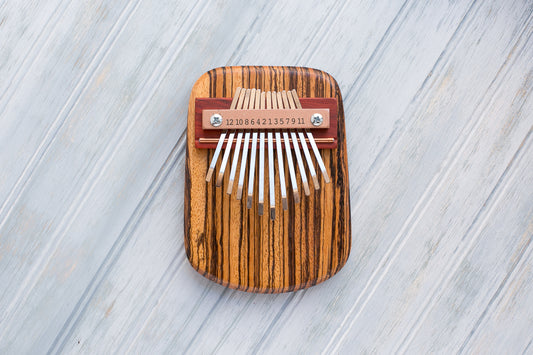 Zebrawood 12 Key Thumbp Piano